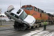 Caption this Photo: How not to Move a Car on a Train